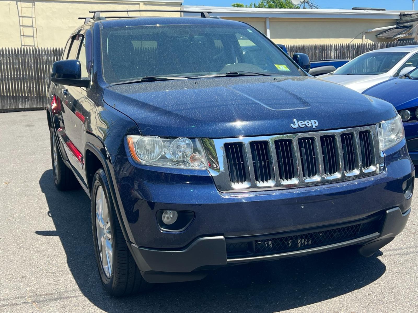 2013 Blue /Beige leather Jeep Grand Cherokee (1C4RJFAG0DC) , located at 1018 Brunswick Ave, Trenton, NJ, 08638, (609) 989-0900, 40.240086, -74.748085 - A really nice loaded up Jeep Grand Cherokee Laredo! - Photo #4
